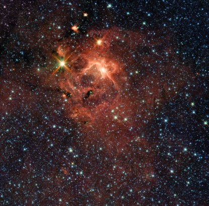 This star-forming region is dominated by the bright, young star IRAS 13481-6124 (upper left), which is about twenty times the mass of our Sun and five times its radius, and is surrounded by its pre-natal cocoon.